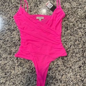 GUESS hot pink thong bodysuit